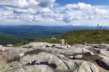 A trail hike with views overlooking the Saguenay fjord and the Saint Lawrence River on our Saguenay & Charlevoix Hiking Tour with Freewheeling Adventures.