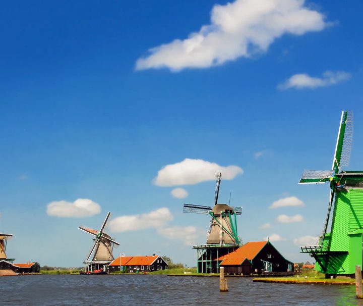 A classic Netherlands windmill on a beautiful day on the easy Amsterdam To Antwerp Bike