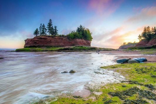This image shows Burntcoat Head Park in Nova Scotia, Canada, during low tide, which is the site of the world's highest recorded tides