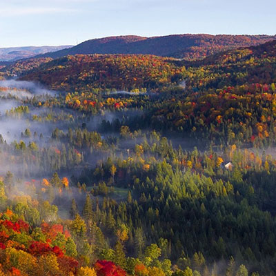 This image captures the autumn foliage in the Laurentian Mountains of Quebec