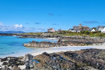 This image shows a scenic coastline on the Isle of Iona, a small island in the Inner Hebrides off the west coast of Scotland