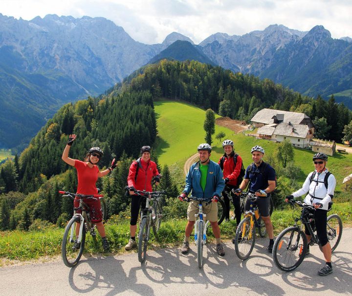 A scenic guided bicycle tour through the mountainous landscape of Slovenia