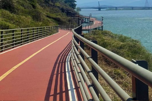 This image shows a portion of the Four Rivers Bike Path in South Korea, a popular long-distance cycling route connecting major cities like Seoul and Busan