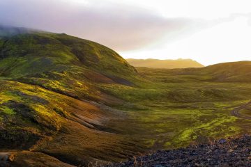 This image shows the vibrant landscapes of Landmannalaugar in the Fjallabak Nature Reserve within the Highlands of Iceland